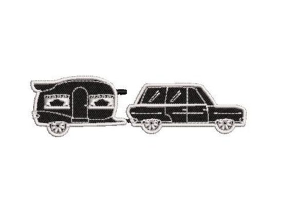 Vintage Camping Trailer Being Towed: A Designer's Review